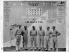 Officers in Front of USS Hornet (CV 12) Scoreboard