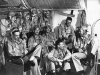 Members of Fighting Squadron (VF) 10 gathered in the squadron's ready room on board USS Enterprise (CV 6) during World War II.