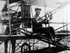 Lieutenant Theodore "Spuds" Ellyson wears civilian clothes prior to a flight in a Curtiss pusher aircraft.
